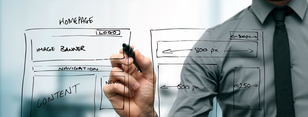 hero designing a website on glass